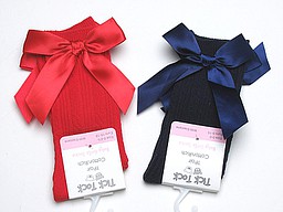 Baby knee highs with ribbed pattern and bow Baby knee highs with ribbed pattern and bow
