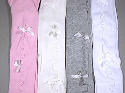 Baby tights with bows in light colors Baby tights with bows in light colors