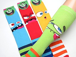Colored knee highs for children with funny faces