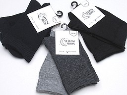 Yellow moon socks for kids in navy, black, and grey