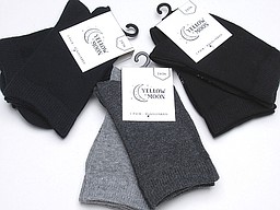 Yellow moon socks in navy, black, and grey