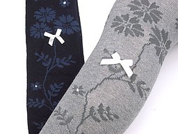 Kids tight with flower branch and bow Kids tight with flower branch and bow