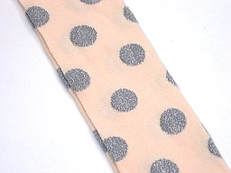 Salmon colored cotton tights with lurex dots