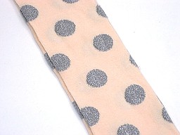 Salmon colored cotton tights with lurex dots Salmon colored cotton tights with lurex dots