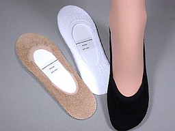 Terry footies in nature, white, and black Terry footies in nature, white, and black