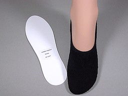 White and black terry cushioned footies