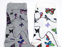 White and grey socks with butterflies