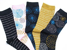 Five pair of socks with lines and circles